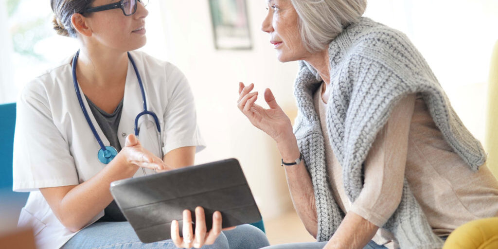 Doctor talking about CCM with woman