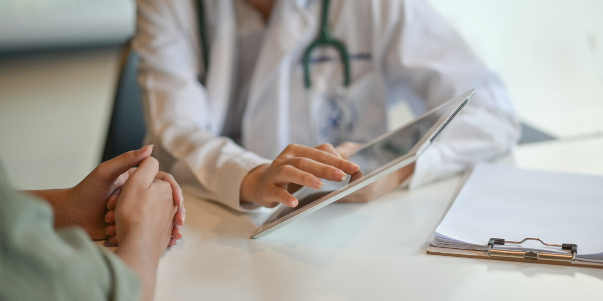 healthcare provider discussing care with patient
